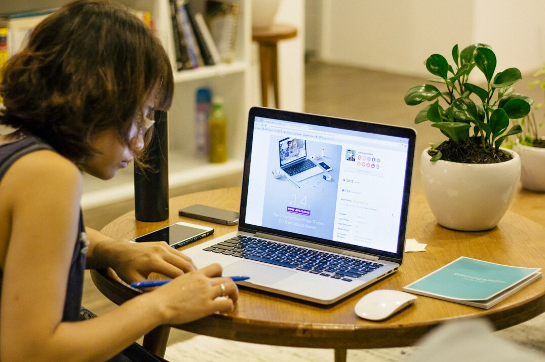 woman taking online course