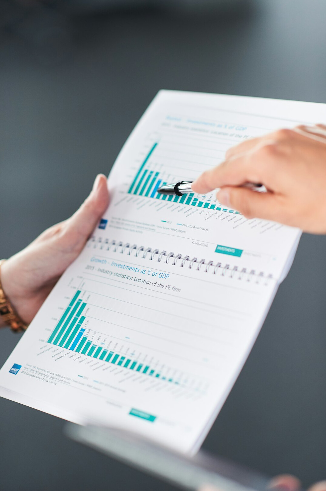 person reviewing progress chart